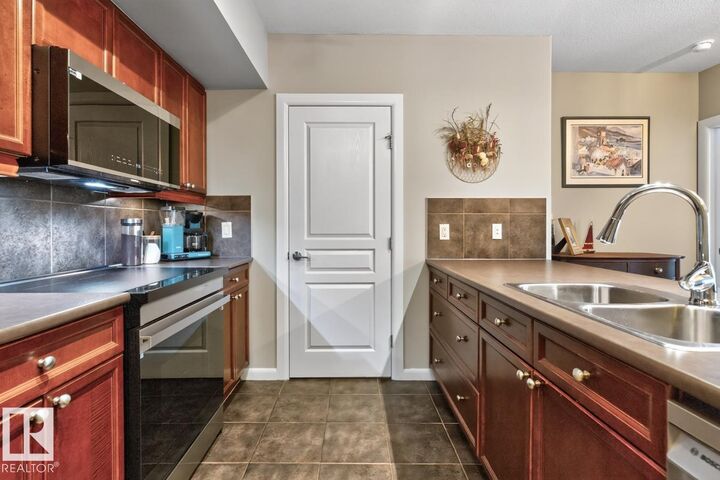 Property Photo: 501 Palisades Way 213 AB T8H 0H8