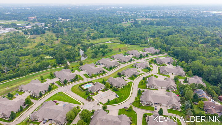 Property Photo:  1229 Waterwalk Drive  MI 49423 