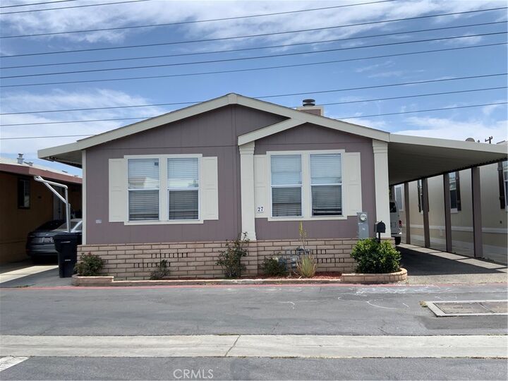 Property Photo:  16600 Downey 27  CA 90723 