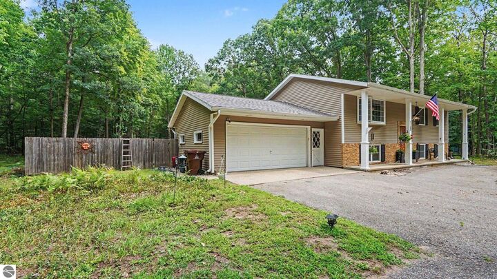 Property Photo: 760 Hiawatha Drive MI 48858