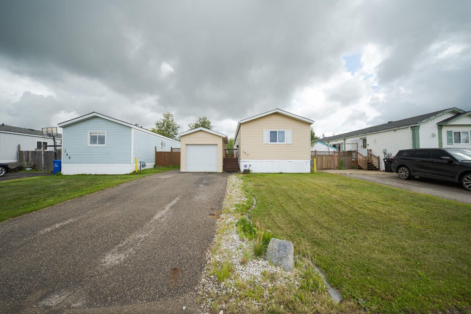 Property Photo: 152 Cree Road AB T9K 1X7