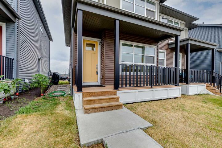 Property Photo: 172 Belmont Way SW AB T2X 5T4