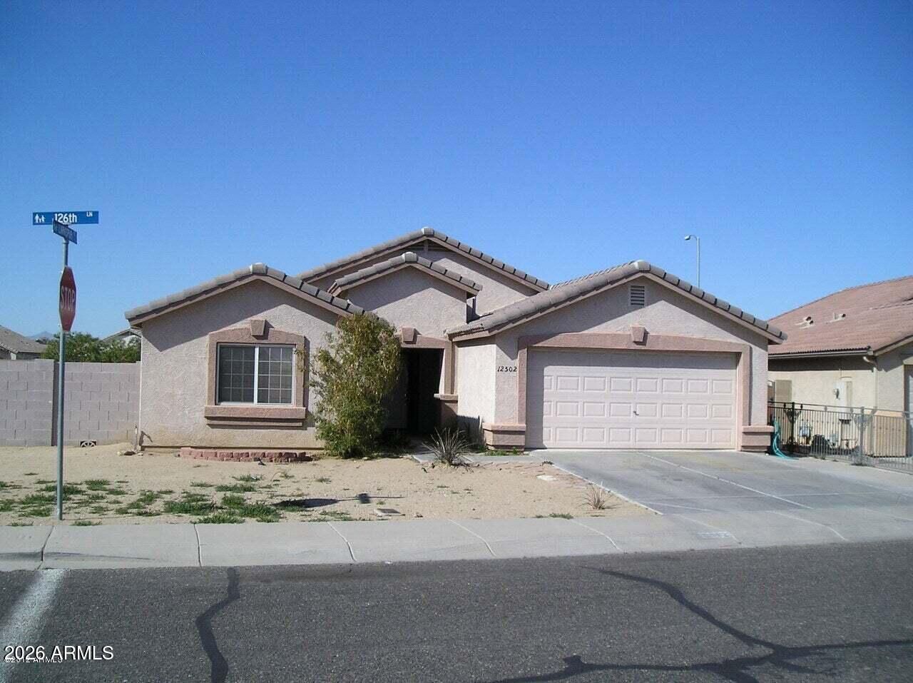 Property Photo: 12502 N 126th Lane AZ 85335
