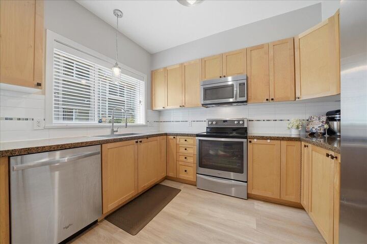 Property Photo: 621 Langside Avenue 19 BC V3J 0A8