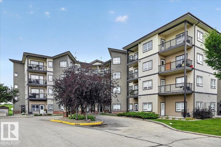 Property Photo:  #306 8702 Southfort Dr  AB T8L 4R6 