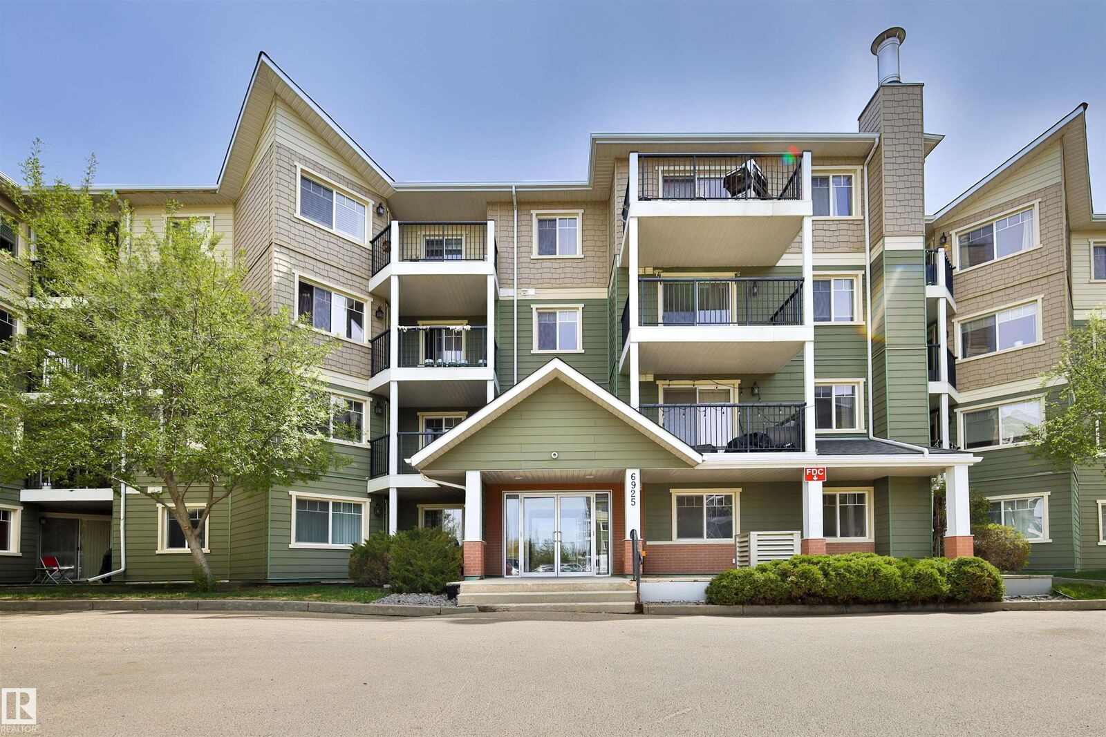 Property Photo: 6925 199 Street NW 213 AB T5T 3X8