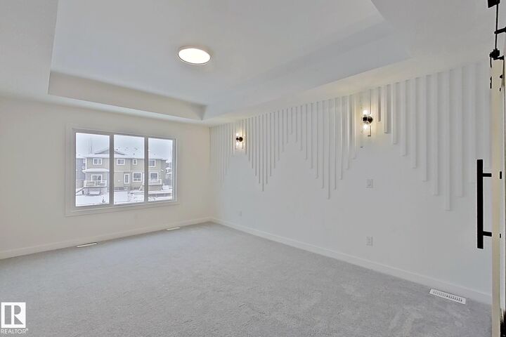 Property Photo: 3158 Magpie Way NW AB T5S 0V4