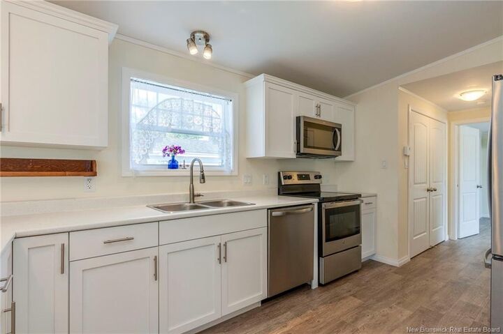 Property Photo:  59 Quail Court  NB E2J 5A1 