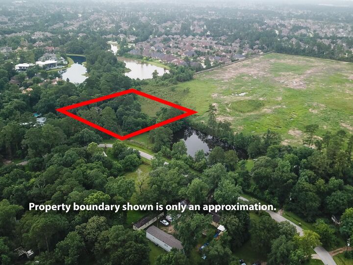Property Photo: 8111 Rolling Oaks Dr TX 77389