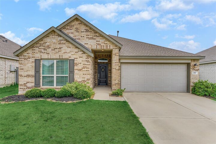 Property Photo:  211 Garnett Street  TX 77354 