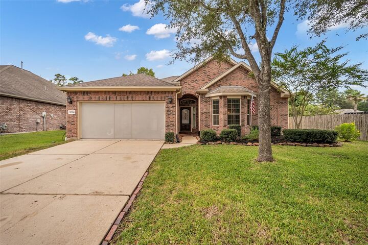 Property Photo:  20743 Oakhurst Creek Drive  TX 77365 