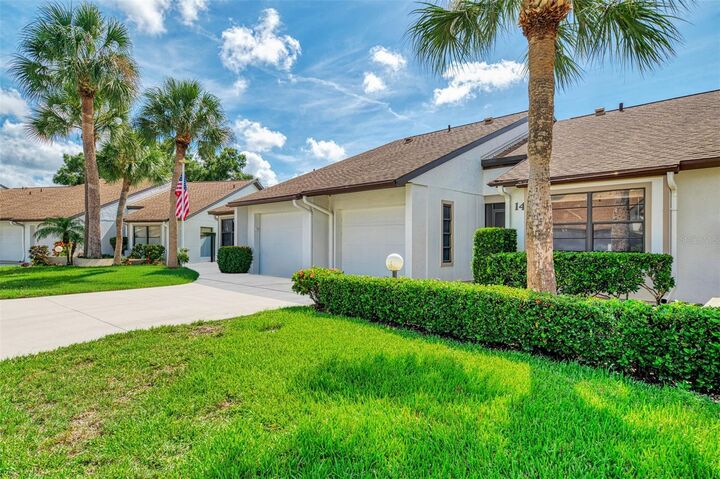 Property Photo: 1211 Capri Isles Boulevard 14 FL 34292