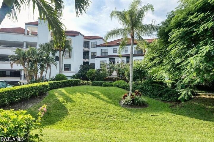 Property Photo:  334 La Peninsula Boulevard 334  FL 34113 