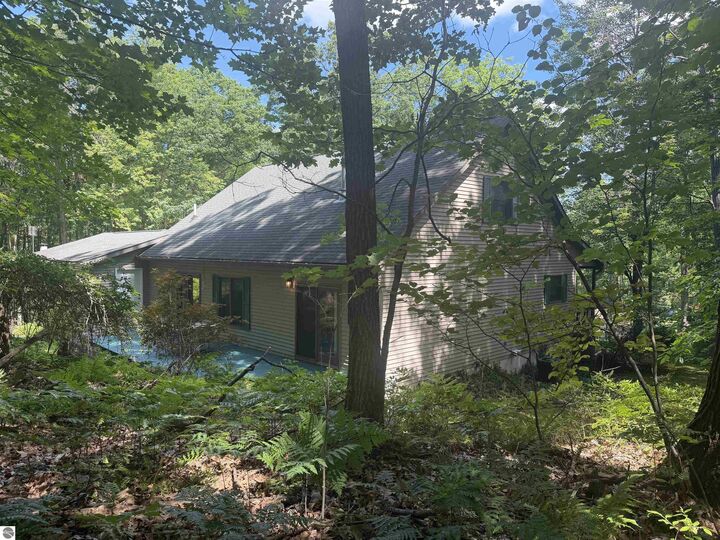 Property Photo:  722 Bungo Lake Road  MI 48625 