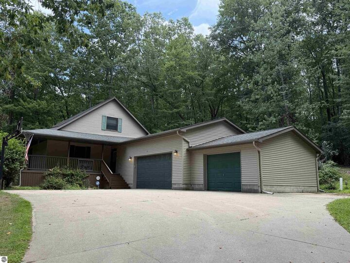 Property Photo:  722 Bungo Lake Road  MI 48625 