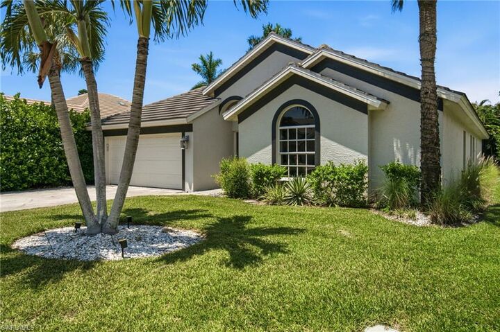Property Photo: 6988 Burnt Sienna Cir FL 34109