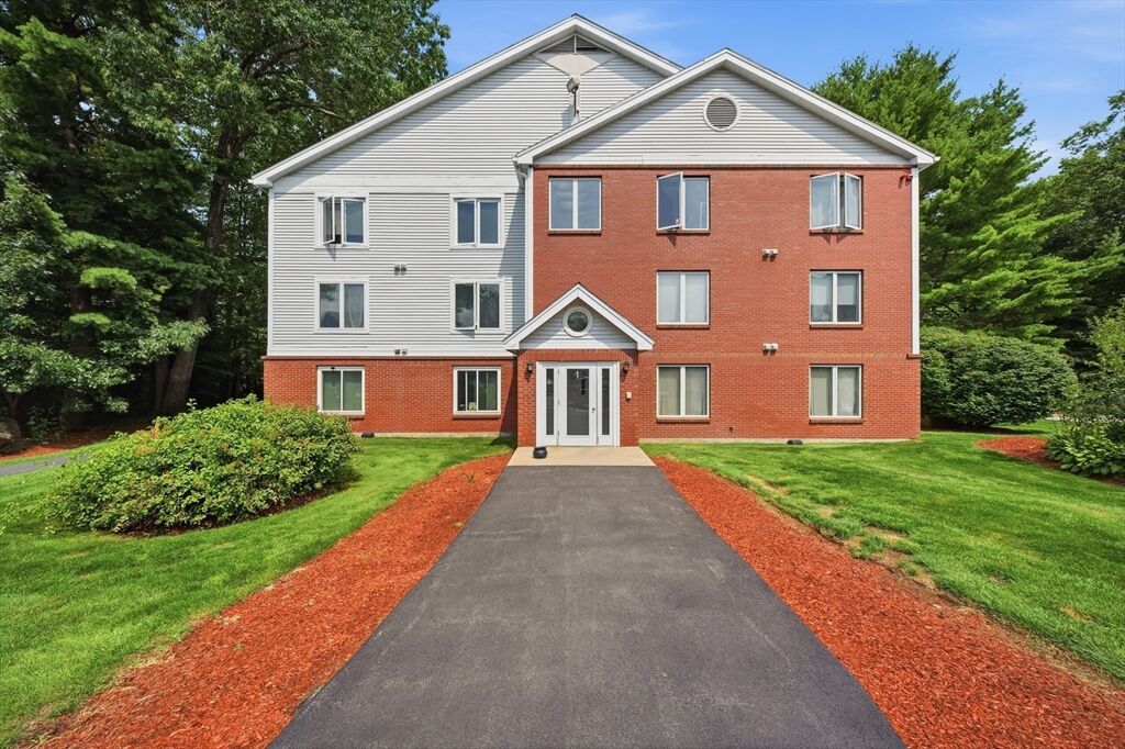 Property Photo:  1 Timberwood Dr 206  NH 03045 