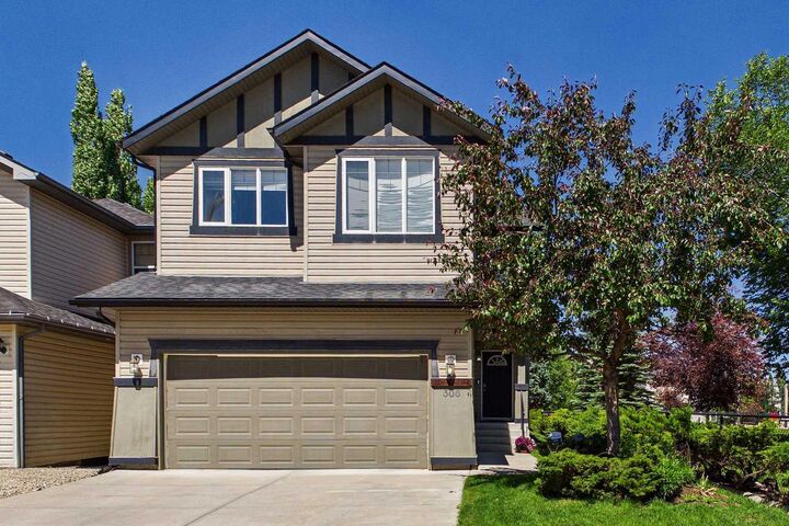 Property Photo: 306 Tuscany Vista Road NW AB T3L 3B4