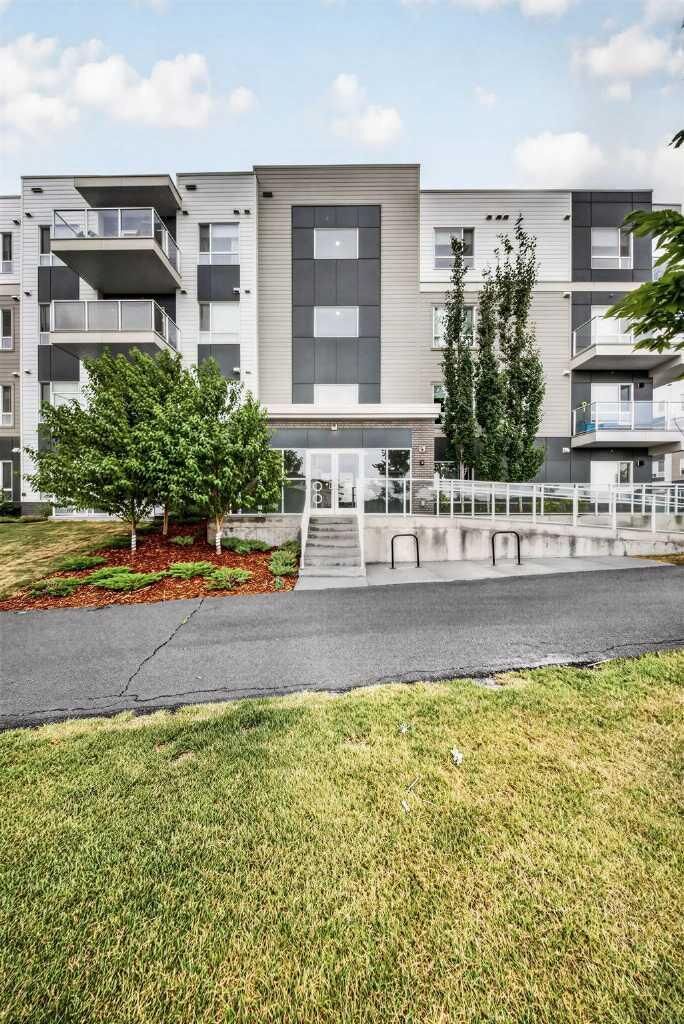 Property Photo:  220 Seton Grove SE 1211  AB T3M 3T1 