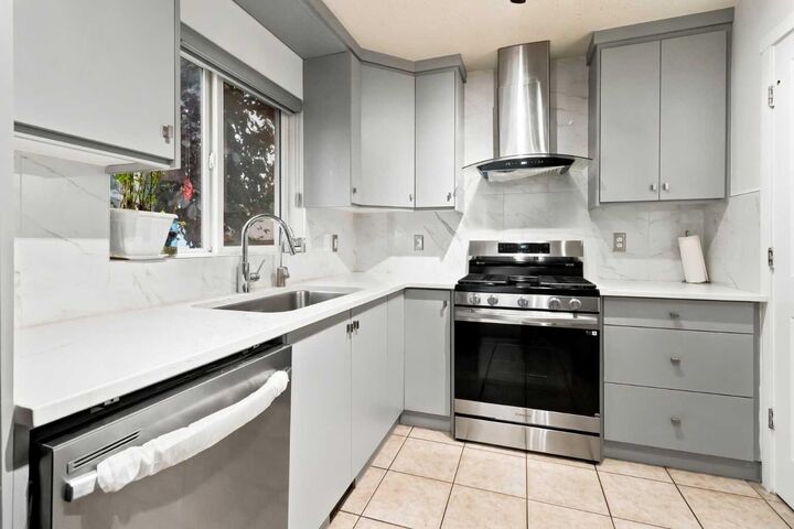 Property Photo: 98 Panatella Hill NW AB T3K 0B6