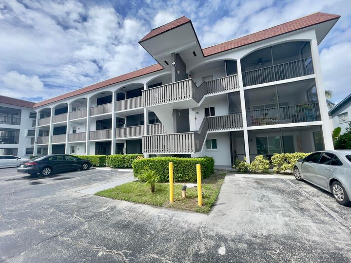 Property Photo: 651 Pine Drive 207 FL 33060