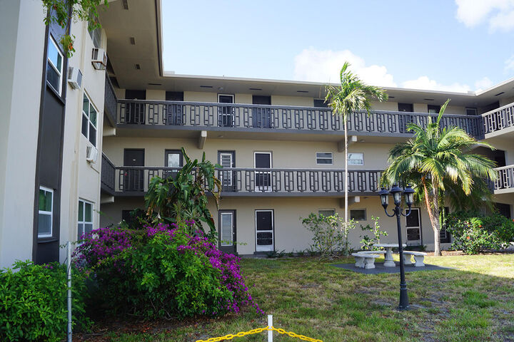 Property Photo:  1250 E Sample Road 303  FL 33064 