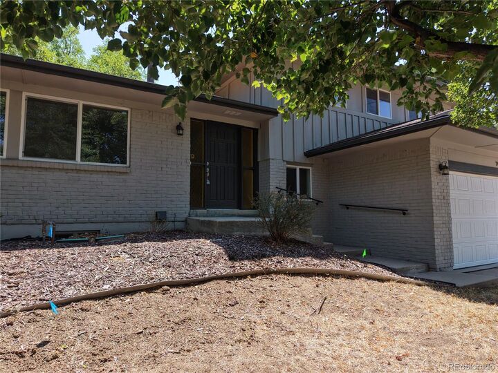 Property Photo:  7073 E Warren Drive  CO 80224 