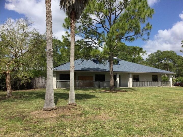 Property Photo:  7261 N 140th Ave  FL 33412 