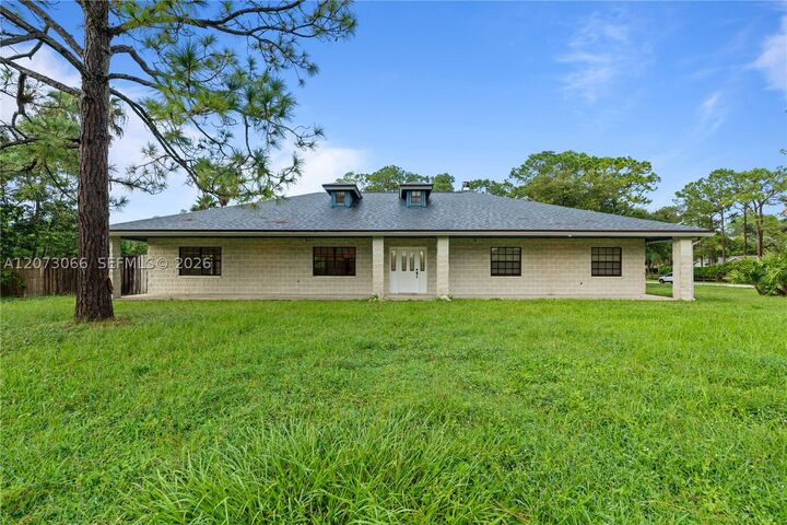 Property Photo: 7261 140th Ave N FL 33412