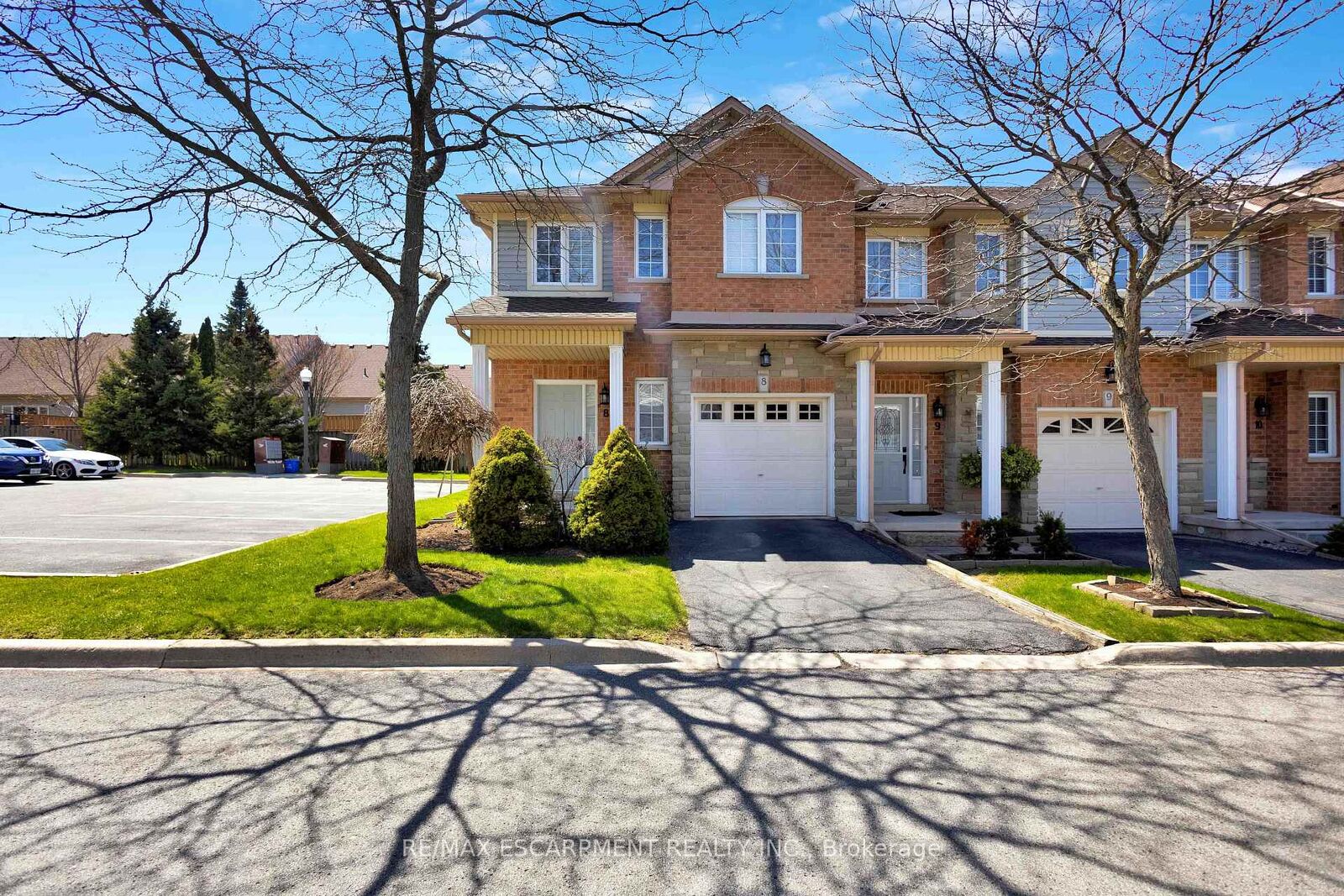 Property Photo: 232 Stonehenge Drive 8 ON L9K 1R5