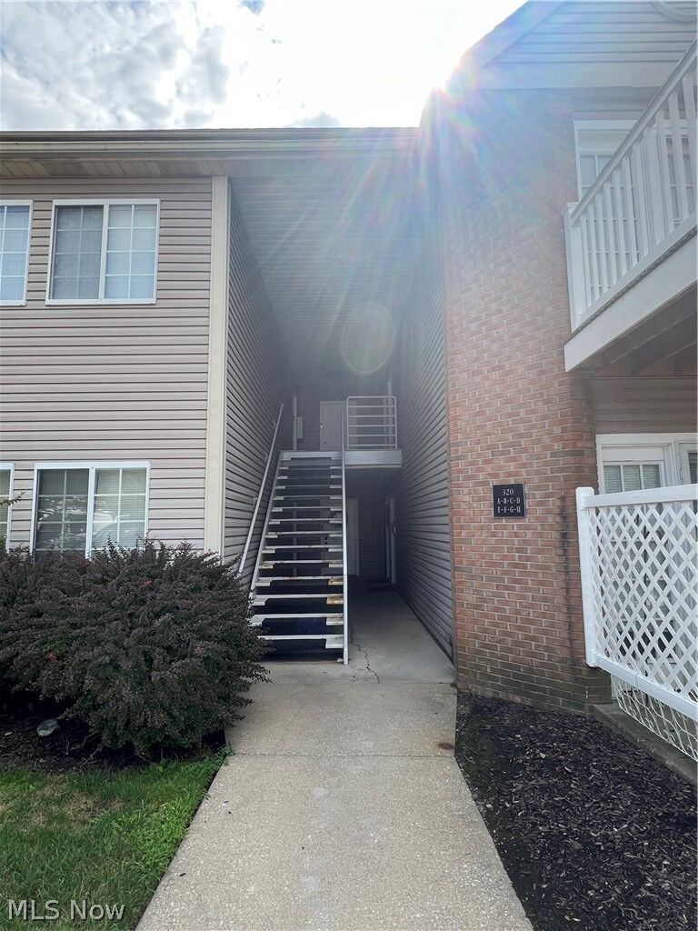 Property Photo:  320 Village Pointe Drive 1  OH 44313 