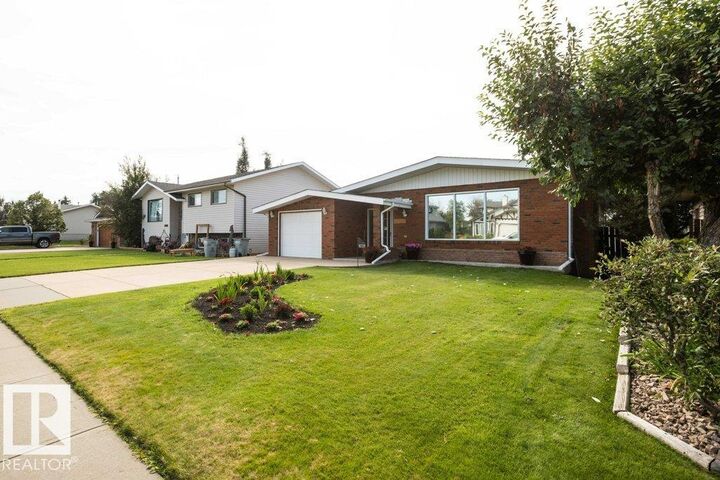 Property Photo:  10729 108A Avenue  AB T7P 1C5 