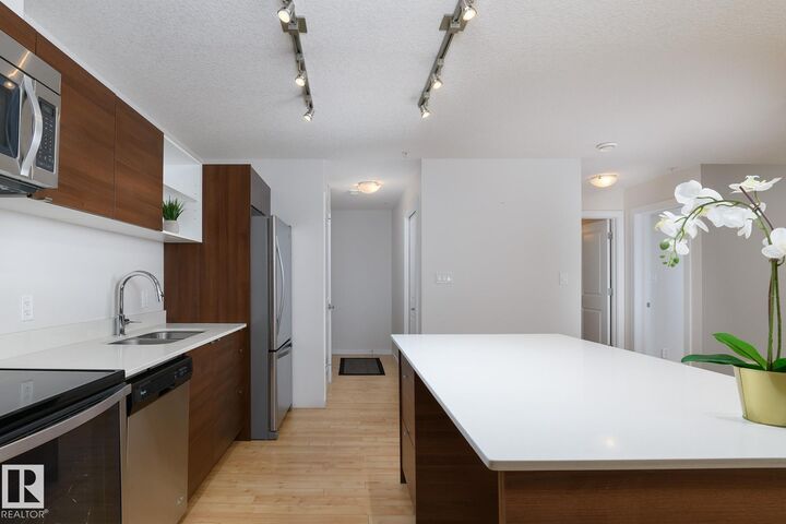 Property Photo:  9523 160 Avenue NW 110  AB T5Z 0N1 