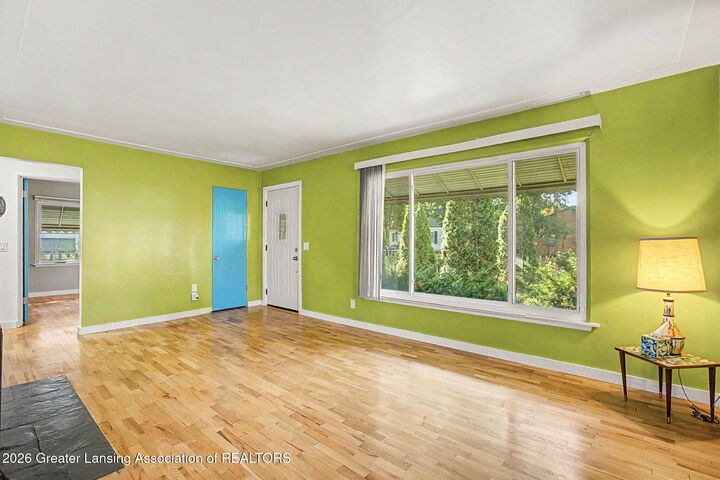 Property Photo:  1424 Poxson Avenue  MI 48910 