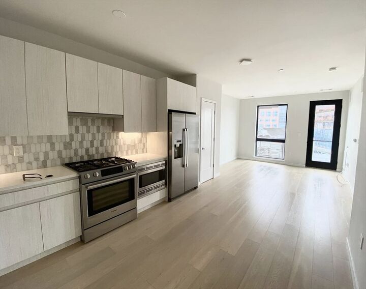 Property Photo:  45 W 3rd Street 501  MA 02127 