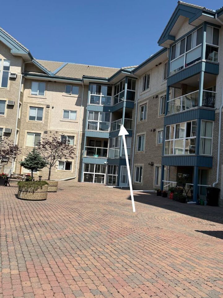 Property Photo: 7239 Sierra Morena Boulevard SW 306 AB T3H 3L7