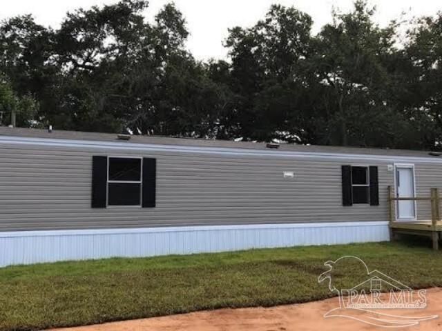 Property Photo:  9802 Fowler Ave  FL 32534 