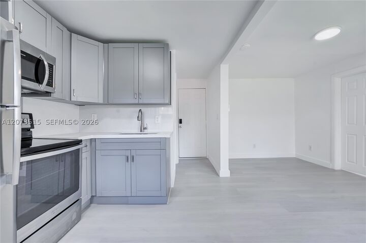 Property Photo:  769 NW 10th St 3  FL 33136 