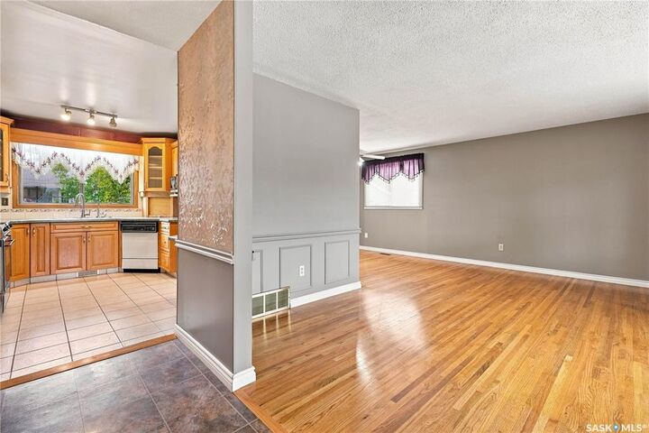 Property Photo: 219 Cambridge Avenue SK S4N 0L6
