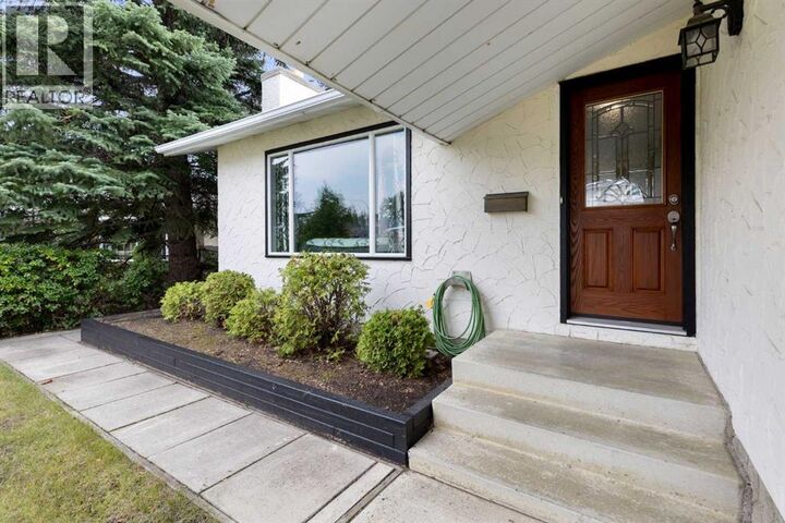 Property Photo:  8419 Silver Springs Road Northwest  AB T3B 4A6 