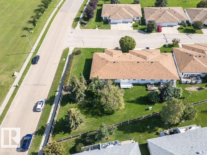 Property Photo:  #1 Century Villas Way  AB T8L 4J8 
