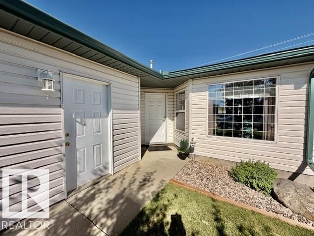 Property Photo:  5714 50 Street 4  AB T9A 3R3 