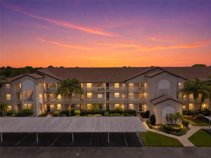 Property Photo:  8735 Olde Hickory Avenue 8304  FL 34238 