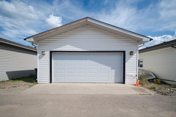 Property Photo: 112 Sandstone Lane AB T9K 0S7