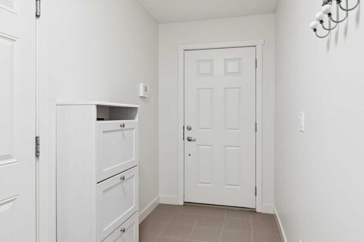 Property Photo: 206 Nolanfield Villas NW AB T3R 0T9
