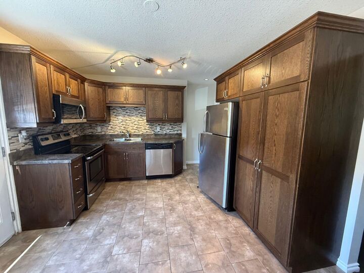 Property Photo:  114 Hardisty Avenue 62  AB T7V 1B5 