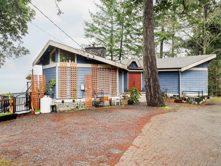 Property Photo: 4553 Cordova Bay Rd BC V8X 3V6
