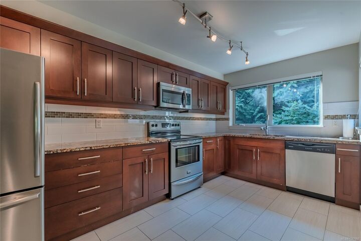 Property Photo: 5670 Edgewater Lane #404 BC V9T 6K1