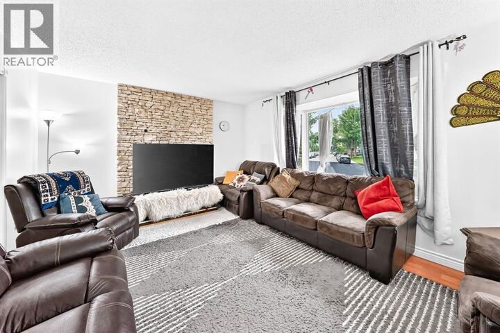Property Photo:  983 Rundlecairn Way Northeast  AB T1Y 2W7 