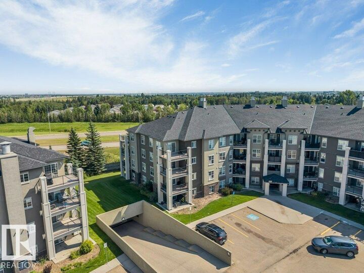Property Photo: 616 McAllister Loop SW 201 AB T6W 1N1